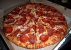 Prise d’otage gourmande : une pizza pour rançon  - Pizza prédécoupée dans sa boîte  