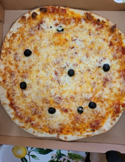 Le Kiosque à Pizzas - Une pizza