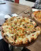 Le buzz resto - Une pizza