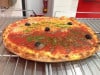 Pizzeria la Tomate Rouge - La pizza moitié emmental moitié anchois persillades