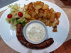 Boca Loca - Saucisse de Toulouse cuit au four à bois avec une sauce à la crème d’oignons