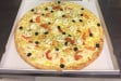 Délices Pizza - Une pizza
