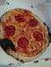 Au Mazet de Grand Mémé - Une pizza à base de tomate 