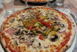 Bella Cucina - Une pizza