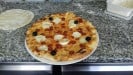 Momo Pizza - Une pizza