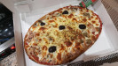 Bella Pizza - Une pizza à emporter