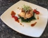 O'Gourmet - La lotte rôtie au thym, tomber d'épinard, coulis de bisque, pousse de poireau et ses cerises de tomates confites.