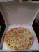 Flo Pizza - Une estelle : tomate, mozzarella, jambon, poivrons, crème fraîche, herbes de provence