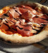 Pizz' à Bus - La pizza sauce tomate, mozzarella de bufflonne campana, jambon de Saint-Daniel, crème de balsamique