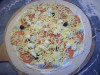 Pizza Fred Et Kitou - Une pizza en préparation