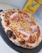 Pizza In Movimento - Une marzo : base tomate, mozzarella, scarmoza fumée, mortadelle pistaché