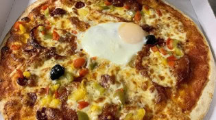 Pizzéria Obélix - Une pizza