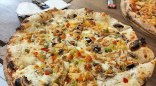 Le buzz resto - Une pizza