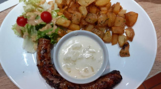 Boca Loca - Saucisse de Toulouse cuit au four à bois avec une sauce à la crème d’oignons