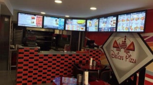 Délices Pizza - La salle de restauration