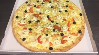 Délices Pizza - Une pizza