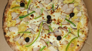Dilak pizza - Un pizza crème poulet curry