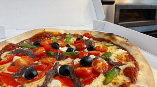 Maison Fadoli - Une pizza