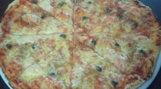 Pizzeria Linda - Une pizza saumon