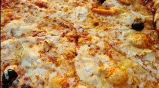 Pizza Plus - Une pizza
