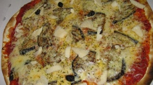 Le coin à pizza - une pizza parmesane