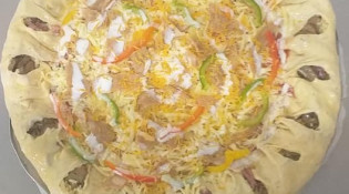 Pizza Royal's - Une pizza pré au four